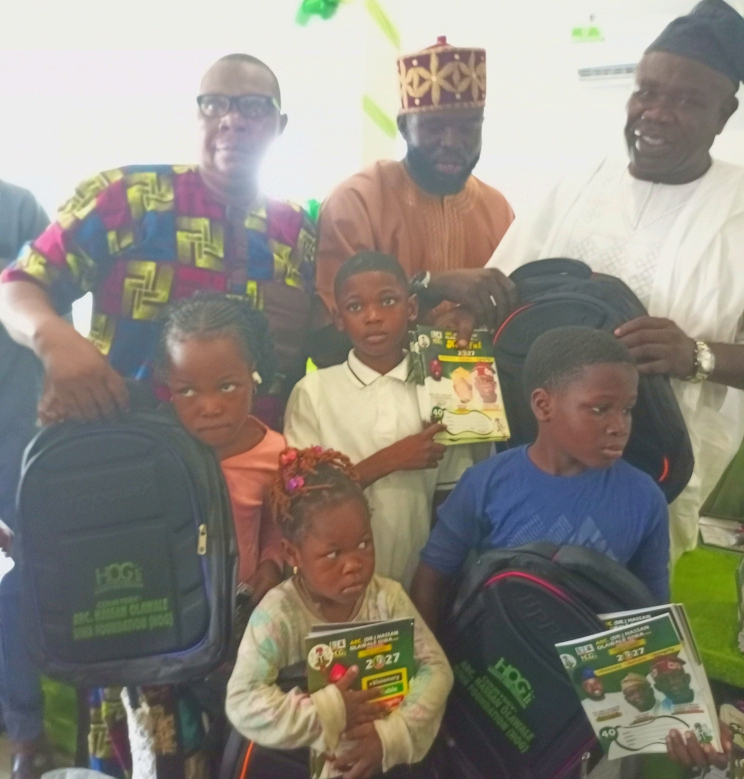 Hassan Giwa Boosts Education In Lagelu, Distributes Bags, Exercise Books Worth #5m To 470 Students Hassan Giwa Boosts Education In Lagelu, Distributes Bags, Exercise Books Worth #5m To 470 Students